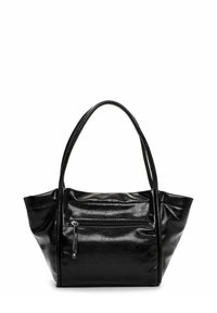 Mustmust mustkott, millel on kaks kätet, esine vetziperi tasku ja kergelt trapeeksi kuju.