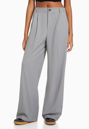 Spodnie materiałowe