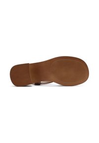 Suola in gomma marrone con texture antiscivolo e un'area liscia. La suola presenta una forma arrotondata e un logo impresso in modo discreto.