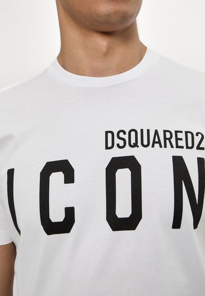 White cotton t-shirt featuring bold black text "DSQUARED2 ICON" prominently displayed across the chest. Classic crew neckline.