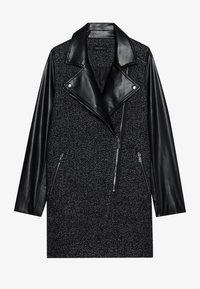 Cappotto a spina di pesce nero e grigio con maniche in pelle e revers oversize. Presenta tasche con zip e chiusura frontale con zip asimmetrica.