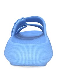 Light blue rubber sandal with a textured sole, open back, and broad strap detail. Smooth finish and flexible design for comfort.