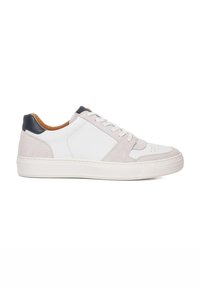 Gray suede and white leather low-top sneakers with a dark blue heel accent, flat white rubber sole, and six white lace eyelets.
