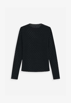 Haut noir en maille texturée à manches longues avec un col rond, vu de dos sur fond blanc.