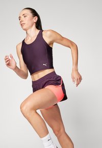 Puma RUN ULTRAFORM CROP TANK W - Linne - midnight plum