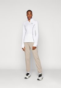 Under Armour RIVAL TERRY JOGGER  - Träningsbyxor - solid timberwolf taupe/white