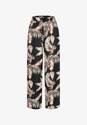 Pantalon noir à jambes larges avec imprimé feuilles tropicales blanches et marron et taille élastique avec cordon noir.
