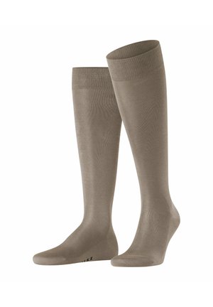 Knee-high socks in light taupe, made of a smooth, stretchy material. Features ribbed cuffs and reinforced toe and heel for durability.