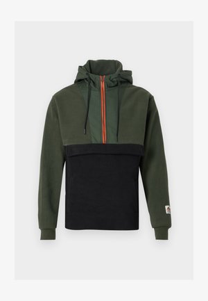 Hoodie i mjuk fleece med mörkgrön överdel och svart underdel, med orange dragkedja och justerbara snören.