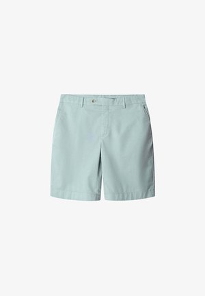 Lichtblauwe katoenen shorts met een zachte textuur, een vlakke voorkant en twee zijzakken. Voorzien van een enkele knoop en ritssluiting.