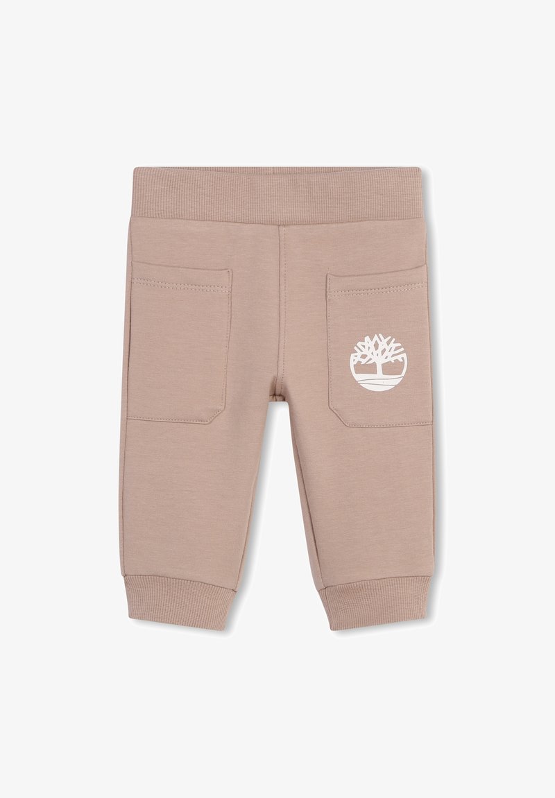 Beige katoenen joggings met een geribde tailleband, twee achterzakken en witte logo-details op de rechterzak. Regular fit.