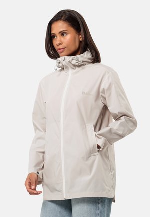 Lightweight, water-resistant hooded jacket in a soft beige color, featuring a front zipper, adjustable hood, and side pockets.