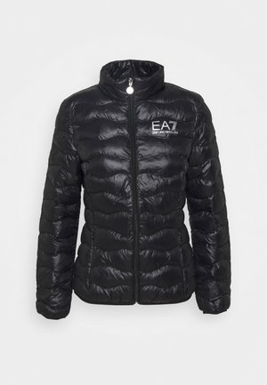 Black quilted zip-up jacket with high collar and white "EA7 Emporio Armani" logo on left chest.