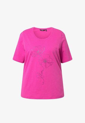 Lyserød kortærmet skjorte med rund halsudskæring, der har to glitrende blomsterkonturer og ordet "flower" skrevet med kursiv på forsiden.