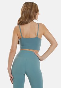 SQUATPROOF Top - pale blue