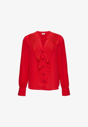 Red blouse with long sleeves, featuring a pleated ruffle detail down the center and five black buttons along the placket. Smooth texture.