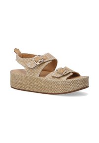 Beige pletené platform sandály s dvojitými nastavovacími popruhy, stříbrnými přezkami a texturovaným svrškem. Silná podrážka pro větší výšku a pohodlí.