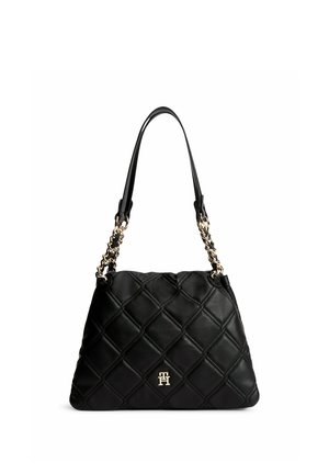 Sac à main en cuir noir matelassé avec poignées en chaîne dorée et petit logo doré "TH" au centre avant.