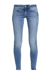 Smala jeans i ljusblå denim med subtila bleknings- och slitdetaljer. Klassisk femficksdesign med metallbeslag.