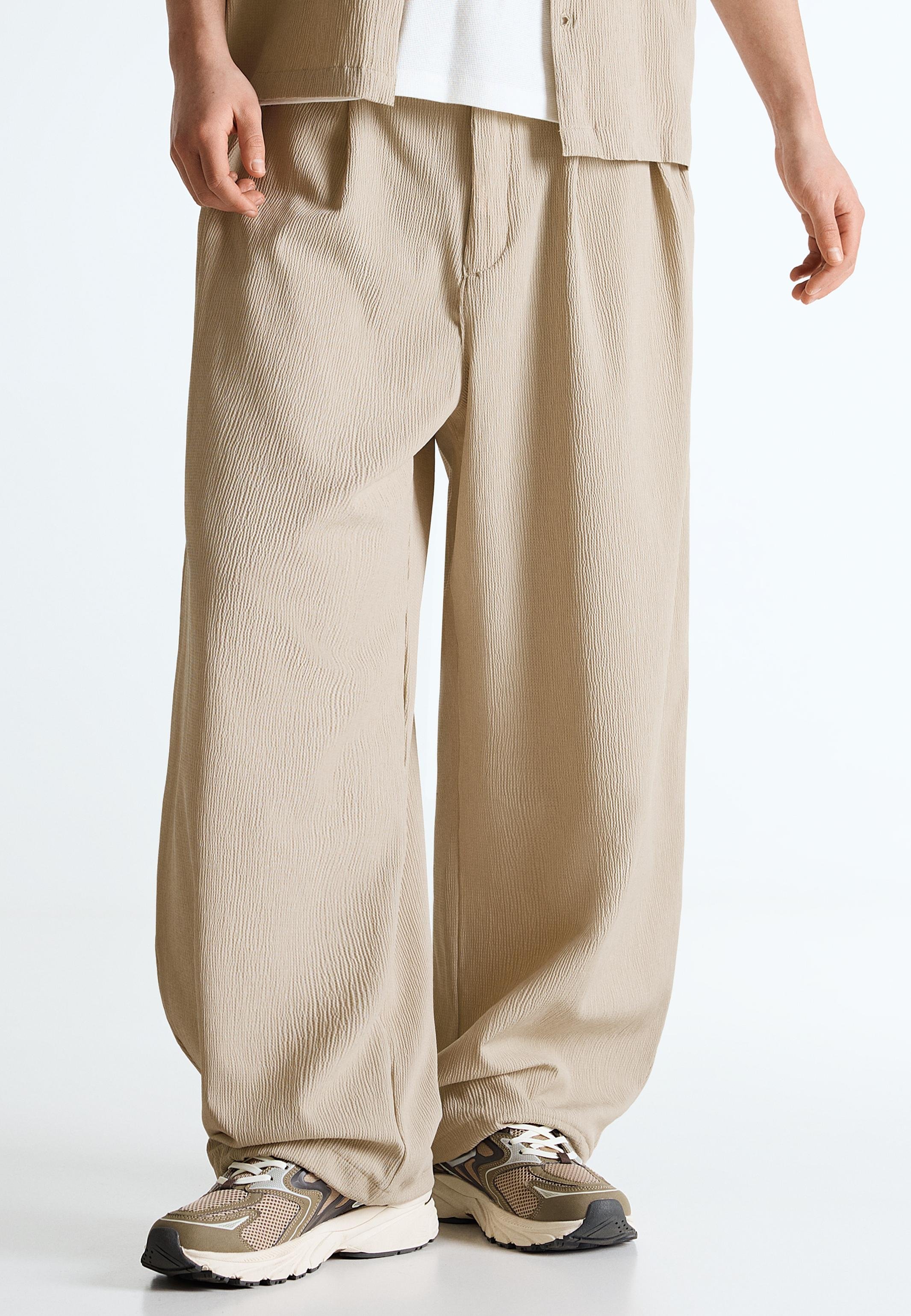 Bershka PLEATED SUPER BAGGY - Trousers - sand - Zalando.ie