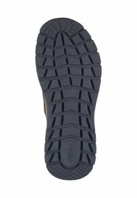 Rubberen schoenzool met diepe profielpatronen voor grip. Donkergrijze kleur met een gestructureerd oppervlak, inclusief logo en diverse patronen voor extra grip.