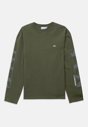 Long-sleeve olive green T-shirt made of cotton, featuring a small white logo on the chest and a patterned grey accent on the sleeves.