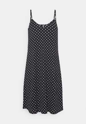 Vestido preto com alças finas e bolinhas brancas. Tecido macio, formato A-line, decote arredondado e barra esvoaçante.