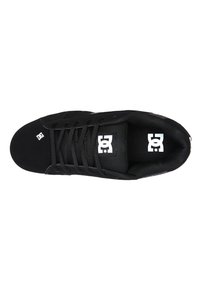 Black skate shoes with a suede and mesh upper, featuring flat laces, a padded collar, and a logo on the tongue.