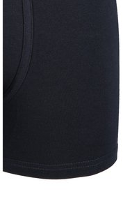 Ciemnoniebieskie męskie bokserki z tkaniny ribbed. Posiadają bezszwową talię i podwójnie przeszywane brzegi dla zwiększonej trwałości.