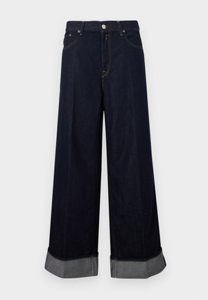 Φαρδιά παντελόνια από σκούρο τζιν με ψηλή μέση, με κούμπωμα κουμπιού και φερμουάρ, αντίθετες ραφές και γυρισμένα μανσέτες με γκρι λεπτομέρειες.