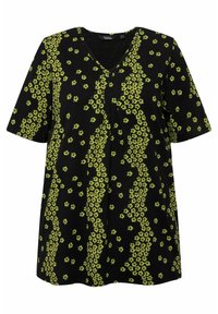 Černá tunika s výstřihem do V, krátkým rukávem, se zeleným květinovým vzorem a dutým detailem na přední straně. Měkká tkanina.