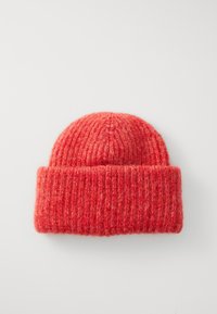 Knit beanie in vibrant red, featuring a ribbed texture and folded cuff, made from soft wool material.