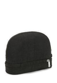 Black, rounded cosmetic bag made from textured fabric. Features a zip closure with silver hardware and a flat base for stability.