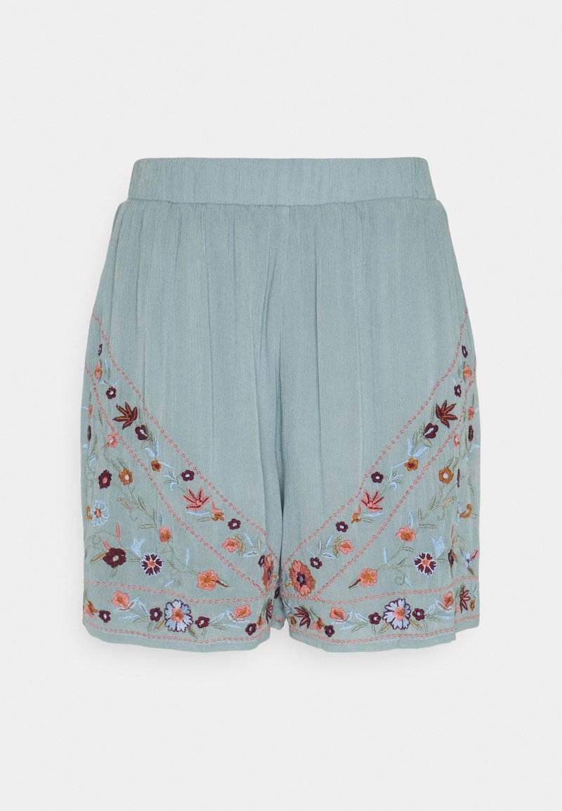 Short bleu clair avec une taille haute présentant une broderie florale multicolore sur les côtés et l'ourlet.