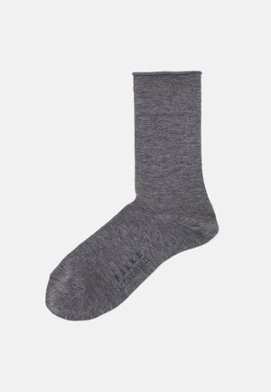 Gray sock with a smooth texture, mid-calf length, and reinforced toe. Features a subtle heather pattern and branding near the ankle.