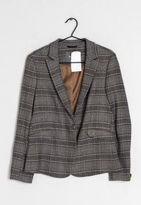Gray and brown plaid blazer with a notched collar, two front pockets, and two buttons; features a smooth brown inner lining.