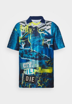 Polo shirt featuring a blue graphic design with yellow accents, depicting text and patterns. Made from lightweight fabric, short sleeves.