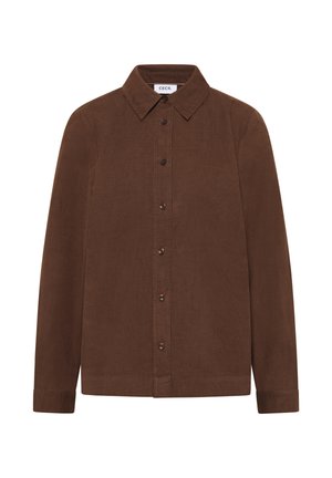 Ruskea corduroy-paita klassisella kauluksella, pitkät hihat ja etupainike. Ominaisuuksina tekstuuri ja pyöristetty helma.