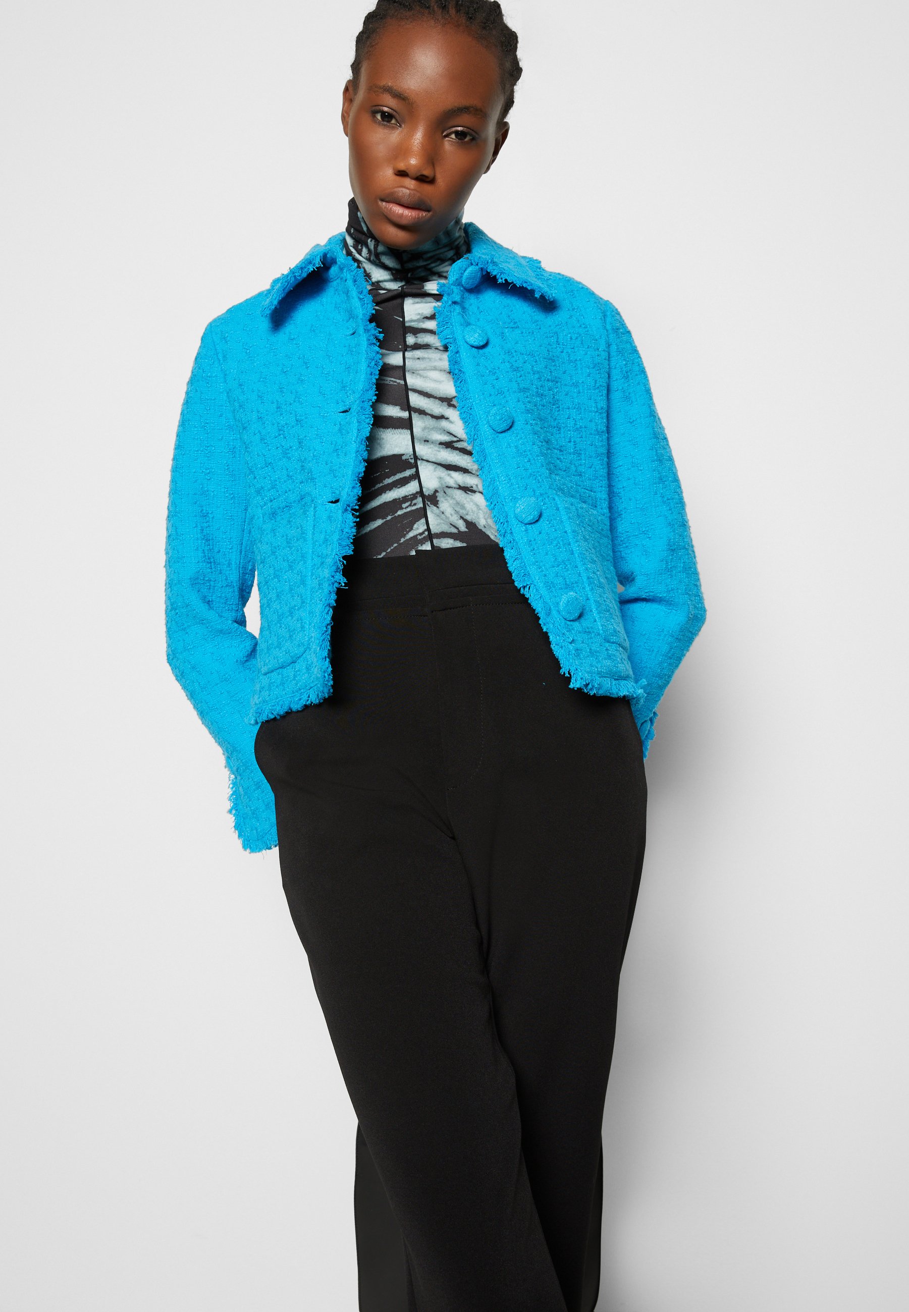 dark blue cropped jacket