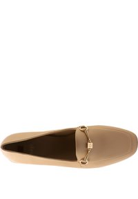 Beige leather slip-on shoe with square toe, featuring a gold chain accent across the vamp and smooth texture throughout.