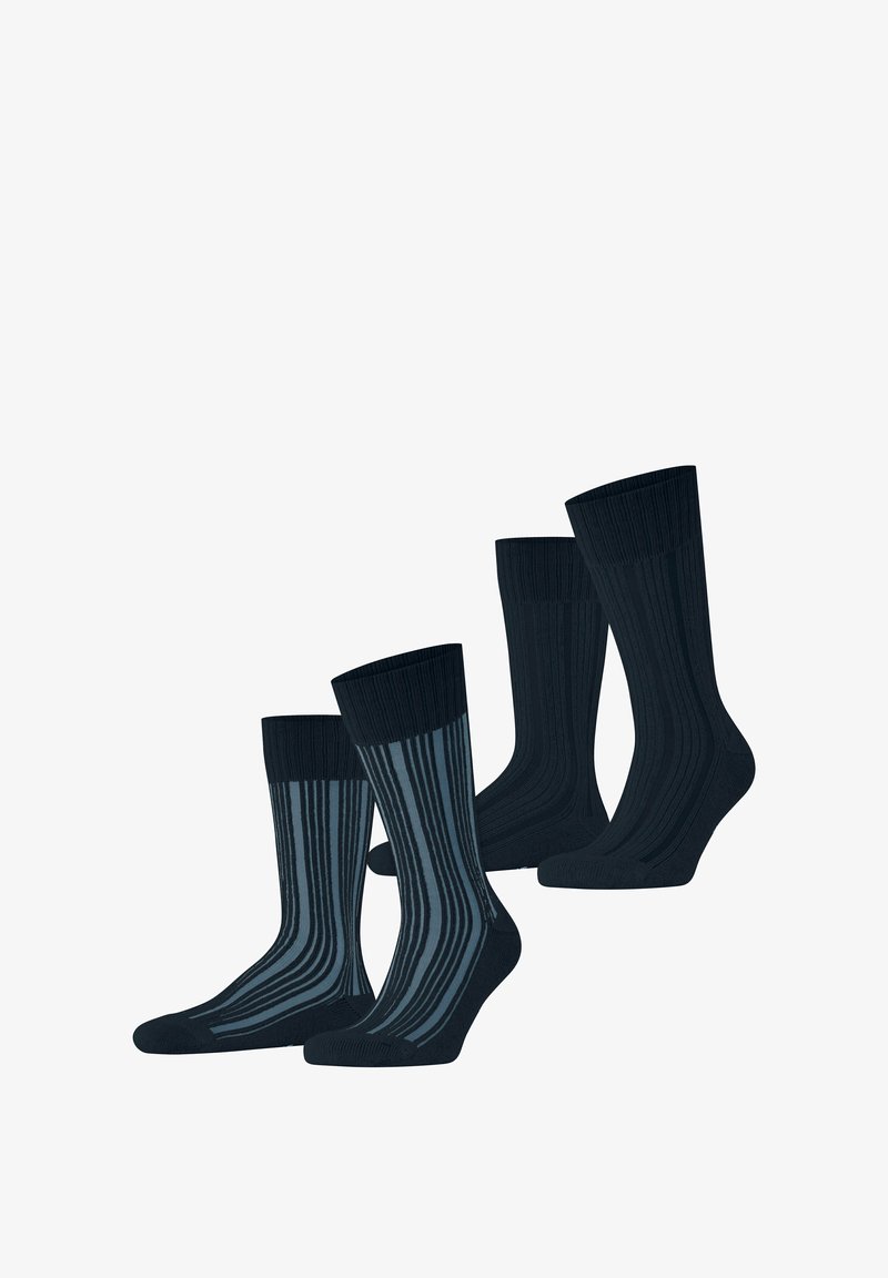 Dwie pary skarpetek do kostek: jedna w jednolitym ciemnogranatowym kolorze, druga ciemnogranatowa w jaśniejsze pionowe paski na białym tle.