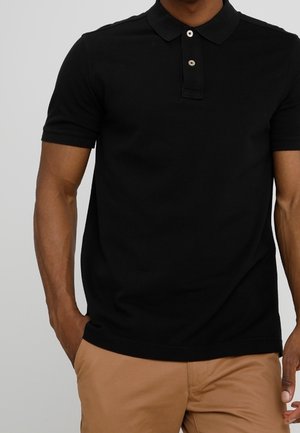 Schwarzes Poloshirt aus Baumwolle mit Kragen und drei Knöpfen. Kurzärmlig, taillierter Schnitt, mit einem kleinen Logo auf der Brust.