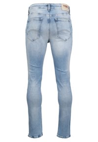 Slim-fit jeans i ljusblå denim, med fransad fåll, två bakfickor med sömnadsdetaljer och en märkeslabel på midjan.