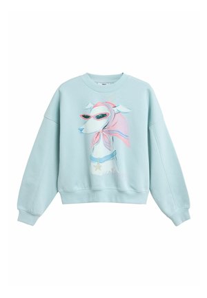 Lyseblå sweatshirt med en grafik af en hund iført pink solbriller, pink hovedtørklæde og en blå halsbånd med et stjerneformet mærke.