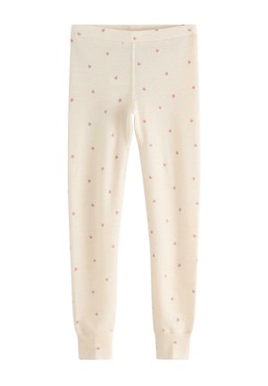 Børneleggings i cremefarve med små, spredte lyserøde hjerteprint og tætsiddende manchetter ved anklerne.