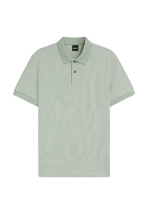Polo verde chiaro in tessuto strutturato, con colletto, abbottonatura a tre bottoni e maniche corte.