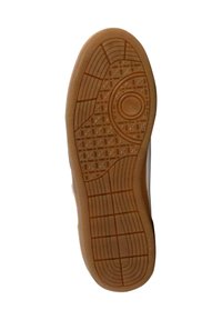 Semelle de chaussure en caoutchouc avec un motif texturé comportant des éléments circulaires et en grille, de couleur brun clair, offrant adhérence et traction.