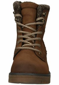 Bottines en cuir marron à lacets avec une douce doublure en fourrure, œillets en métal et surfaces texturées. Elles sont dotées d'une semelle plate en caoutchouc et de lacets contrastants.