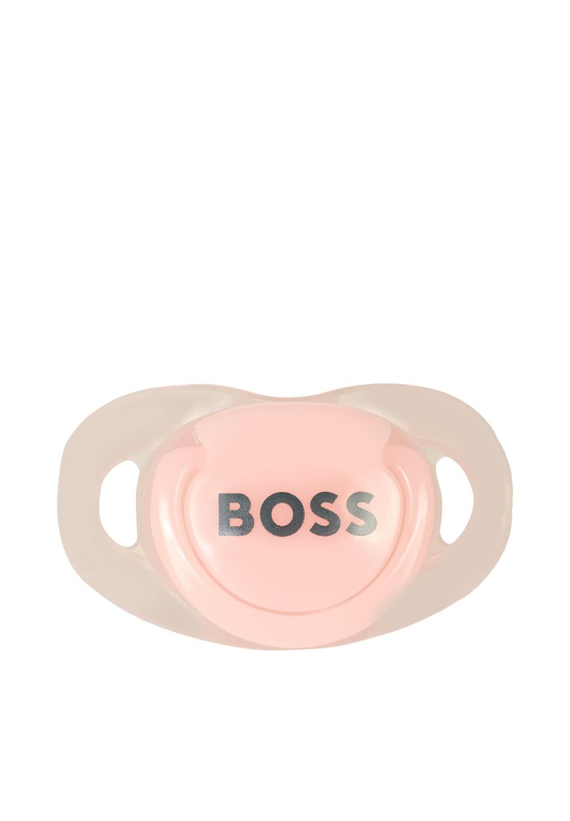 Ροζ πιπίλα με γυαλιστερή φινίρισμα, σε κυκλικό σχήμα και τη λέξη "BOSS" σε ασημί, περιτριγυρισμένη από διαφανείς πλαστικές λαβές.