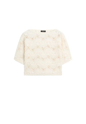 Blouse en dentelle crème à manches courtes avec motif ondulé festonné et encolure ronde, présentée à plat sur fond blanc.